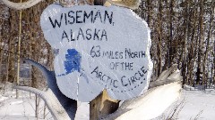 sign Wiseman Alaska 63 miles north of the Arctic Circle