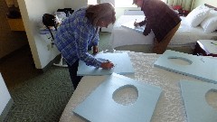 Kay Overbay; Norm Overbay; Graduation Dinner; preparing the Blue Foam toilet seats for Road Scholar Staff