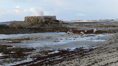 Boats beached by the low tide; Channel Islands; Guernsey