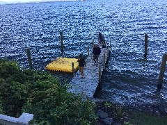 Katherine (Kat) McDougal Wheeler McCandless; Kurt McCandless; 
Ellery Wheeler; on the dock Airbnb in Alton, NH