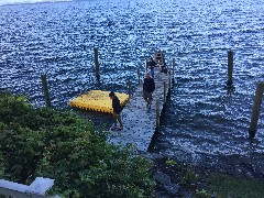 Katherine (Kat) McDougal Wheeler McCandless; Kurt McCandless; Ellery Wheeler; on the dock Airbnb in Alton, NH