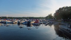 boats moored at the pier on Canandaigua Lake
