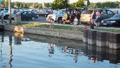 kids fishing from the pier at Canandaigua Lake