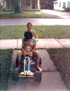 Katherine (Kat) McDougal Wheeler McCandless; Andy McDougal; Ben Dorrough; Lawnmower