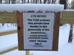 sign Attn Visitors
The trail crosses this private land thanks to th generosity of the landowners Please respect landownwe wishes foot travel only