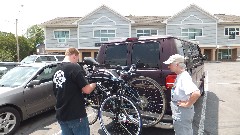 Ruth Bennet McDougal Dorrough McDougal Dorrough; New bike being loaded onto the van