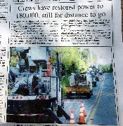 newspaper article Crews have restored power to 1800,000, still ar distance to go