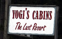 sign Yogi s Cabins; The Last Resort