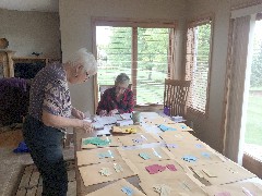 stuffing envelopes for the NCTA conference in Fargo