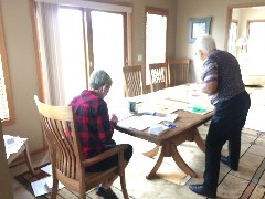 stuffing envelopes for the NCTA conference in Fargo